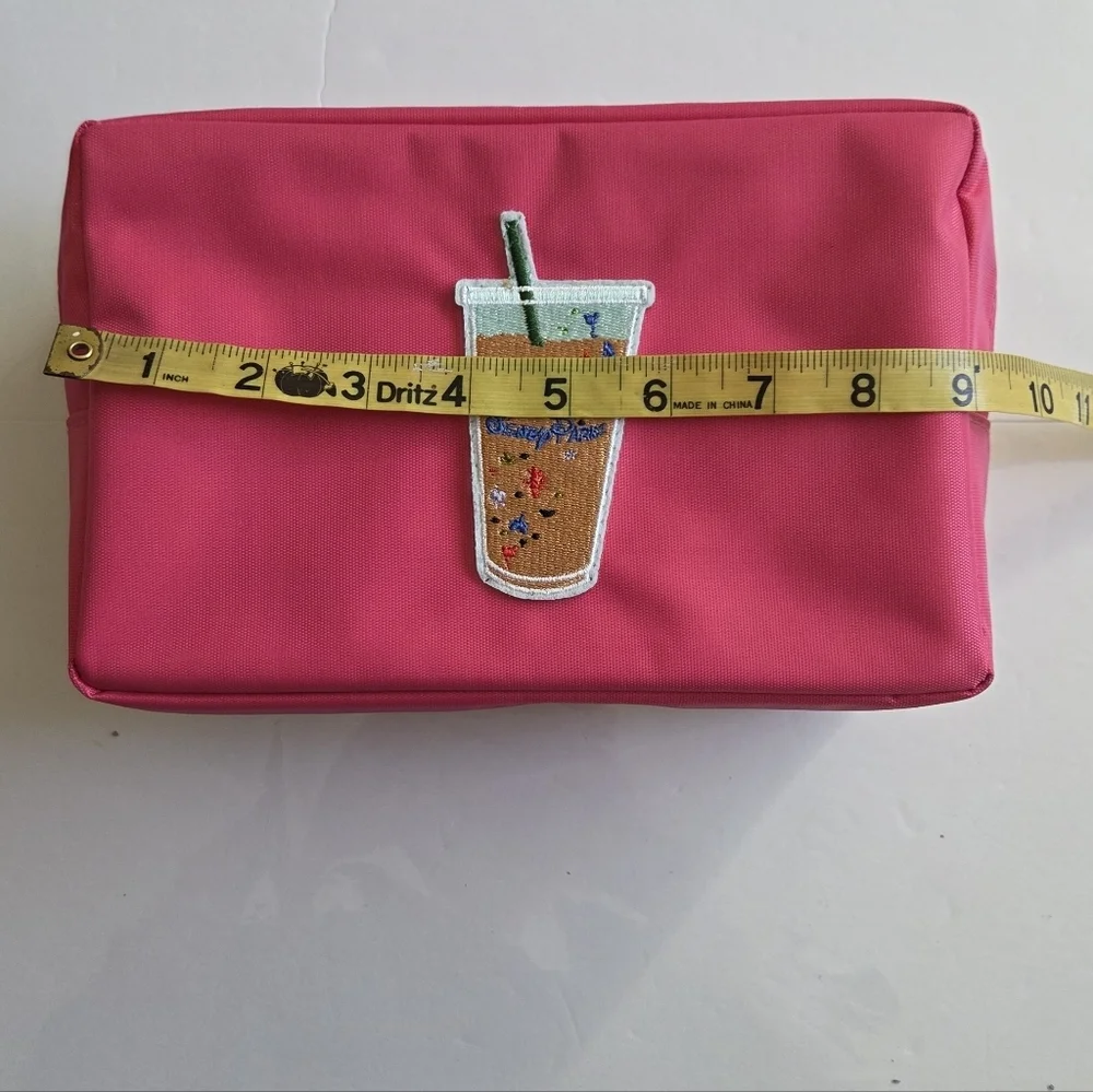 Pink Zipper Pouch with Embroidered Disney Design.